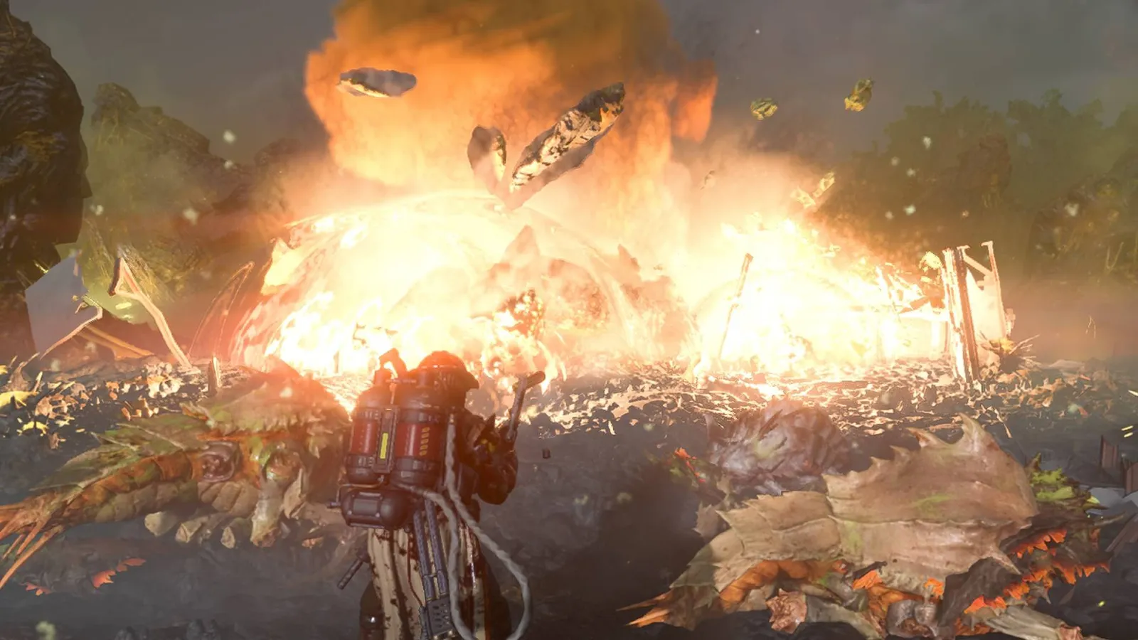 Helldivers 2 Helldiver destroying a bug nest (official press image)